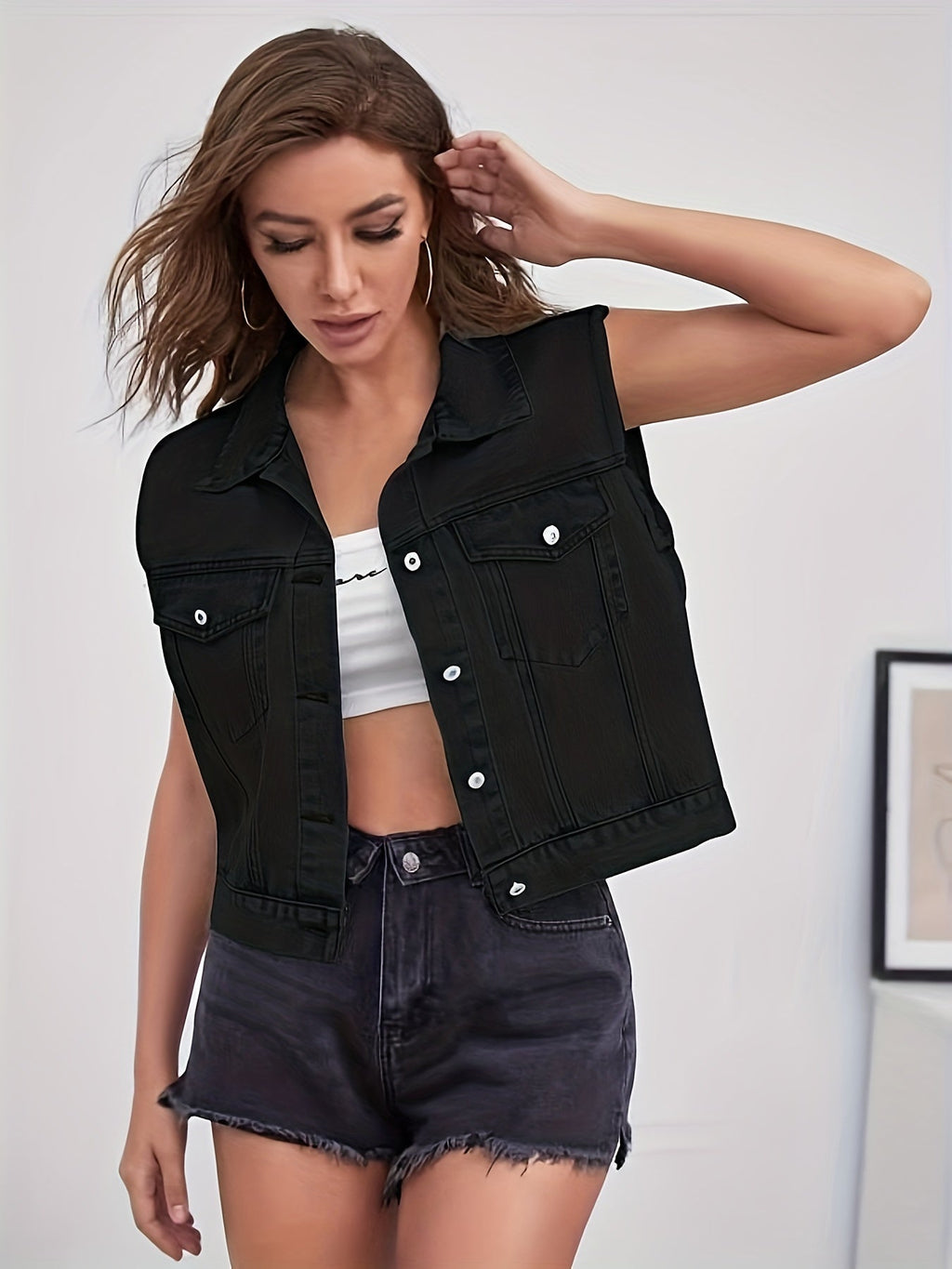 Veste en jean sans manches avec poches plaquées