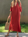 Robe femme unie avec décolleté en V, poche et décolleté en V