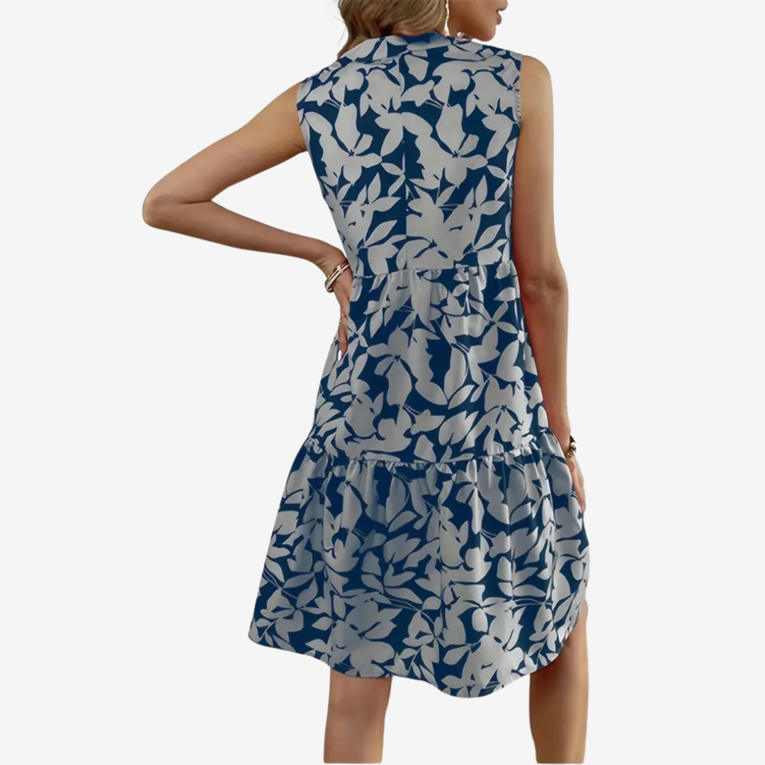Daphne | robe midi élégante, coupe évasée, détails floraux.