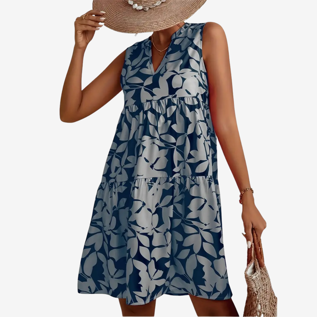 Daphne | robe midi élégante, coupe évasée, détails floraux.