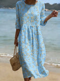 Natalie | Robe midi avec motif de plantes et de fleurs et col rond