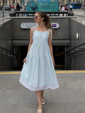 Nathalia | Robe midi à bretelles nouées sans manches avec motif rayé