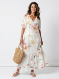 Noa | Robe midi à volants florale douce avec pompons