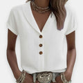 Mucelle | Blouse avec col revers et patte de boutonnage