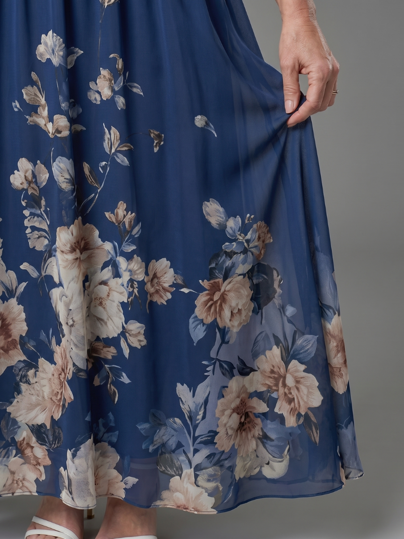Clarissa | Robe midi sans manches à encolure en V et ourlet floral doux