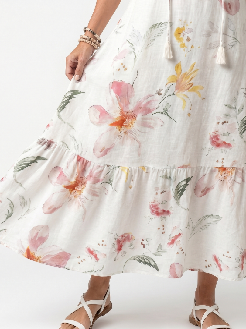 Noa | Robe midi à volants florale douce avec pompons