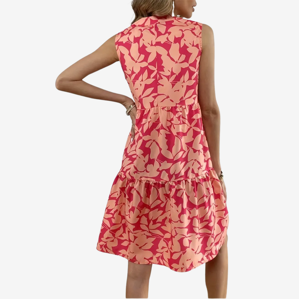 Daphne | robe midi élégante, coupe évasée, détails floraux.