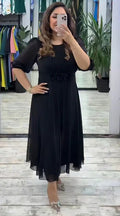 Jiny | Robe midi plissée élégante
