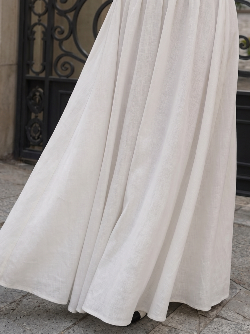 Jeven | Robe midi à bretelles halter et corsage ajusté