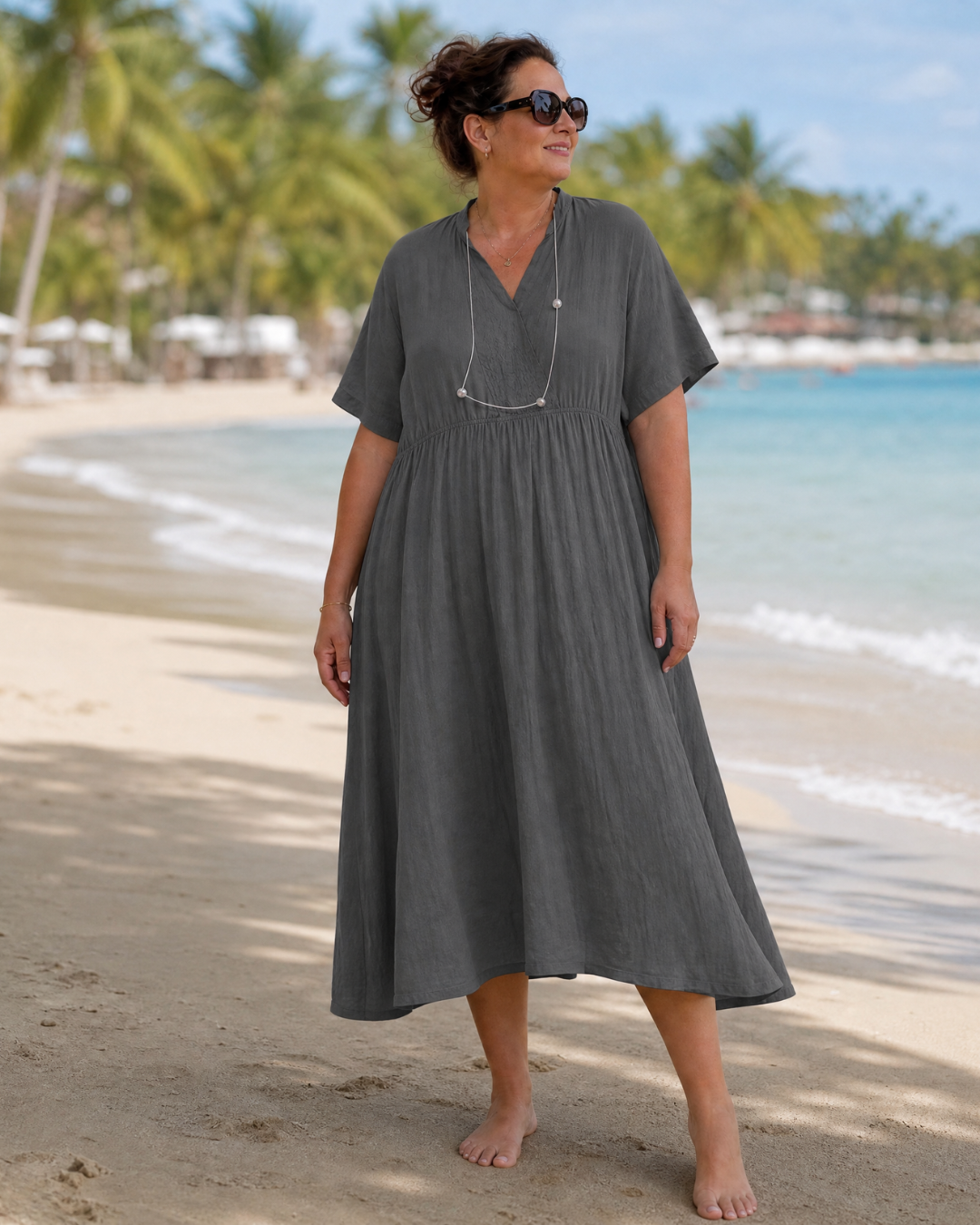 Eupherene | Robe midi décontractée à col en V et manches courtes texturée