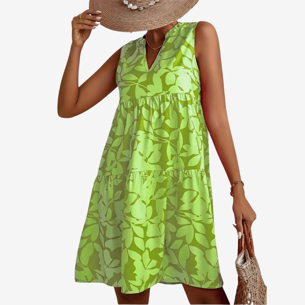 Daphne | robe midi élégante, coupe évasée, détails floraux.