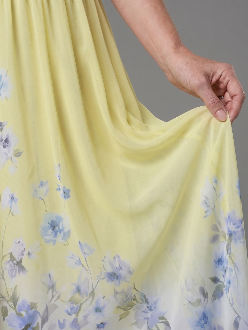 Clarissa | Robe midi sans manches à encolure en V et ourlet floral doux