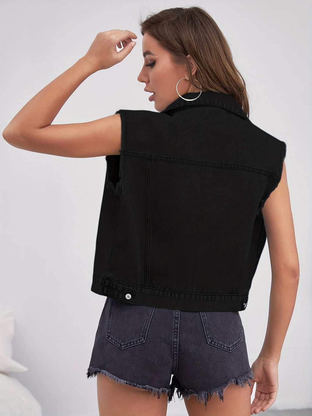 Veste en jean sans manches avec poches plaquées