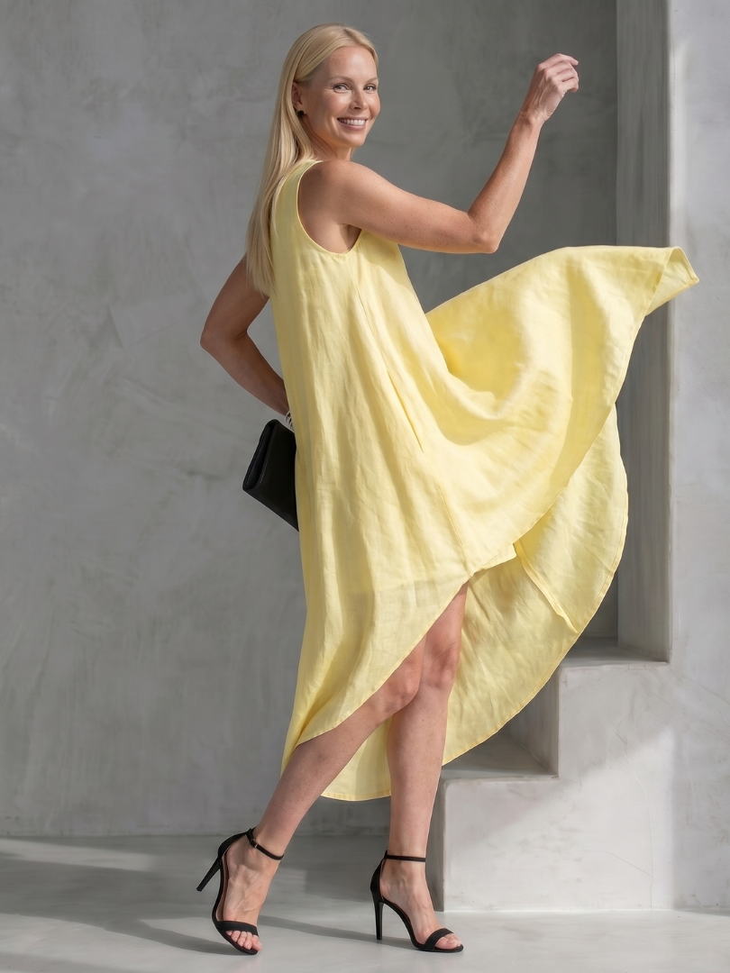 Zoya | Robe Midi Fluide Sans Manches à Ourlet Haut-Bas