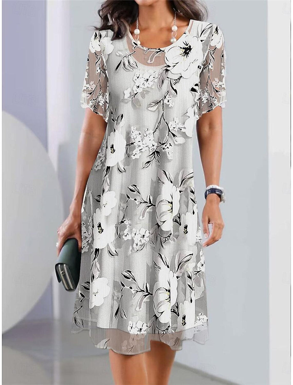 Kali | Robe midi élégante avec décolleté rond