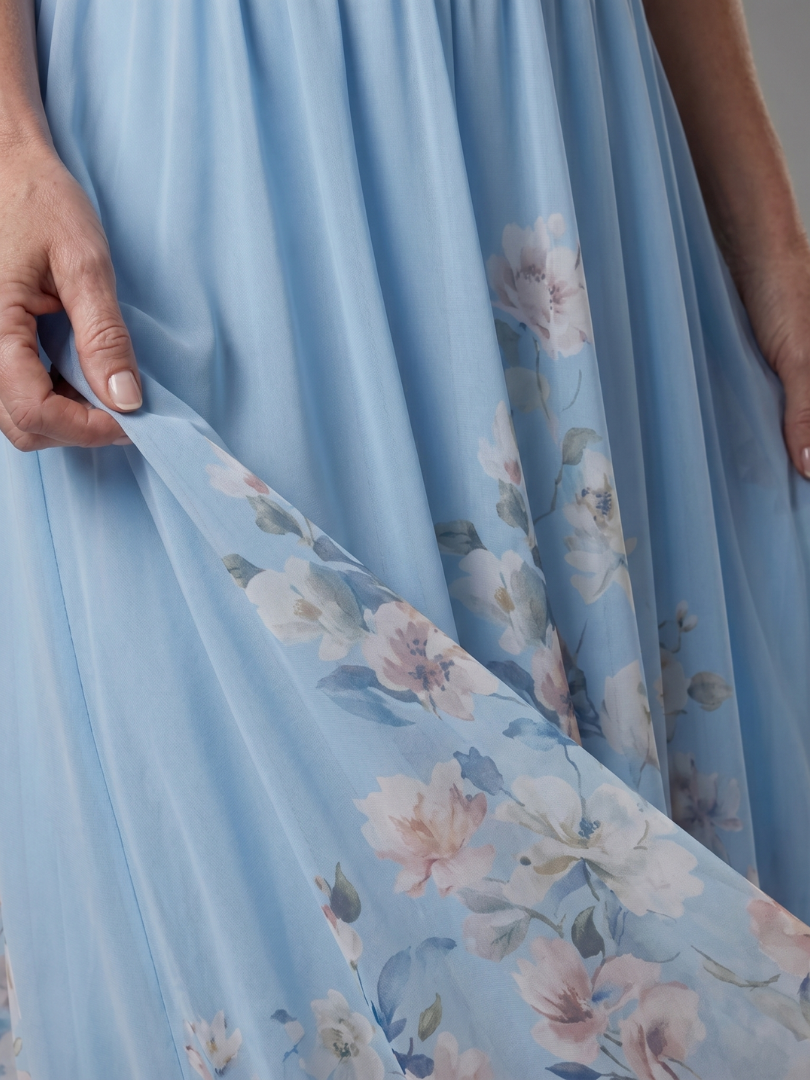 Clarissa | Robe midi sans manches à encolure en V et ourlet floral doux