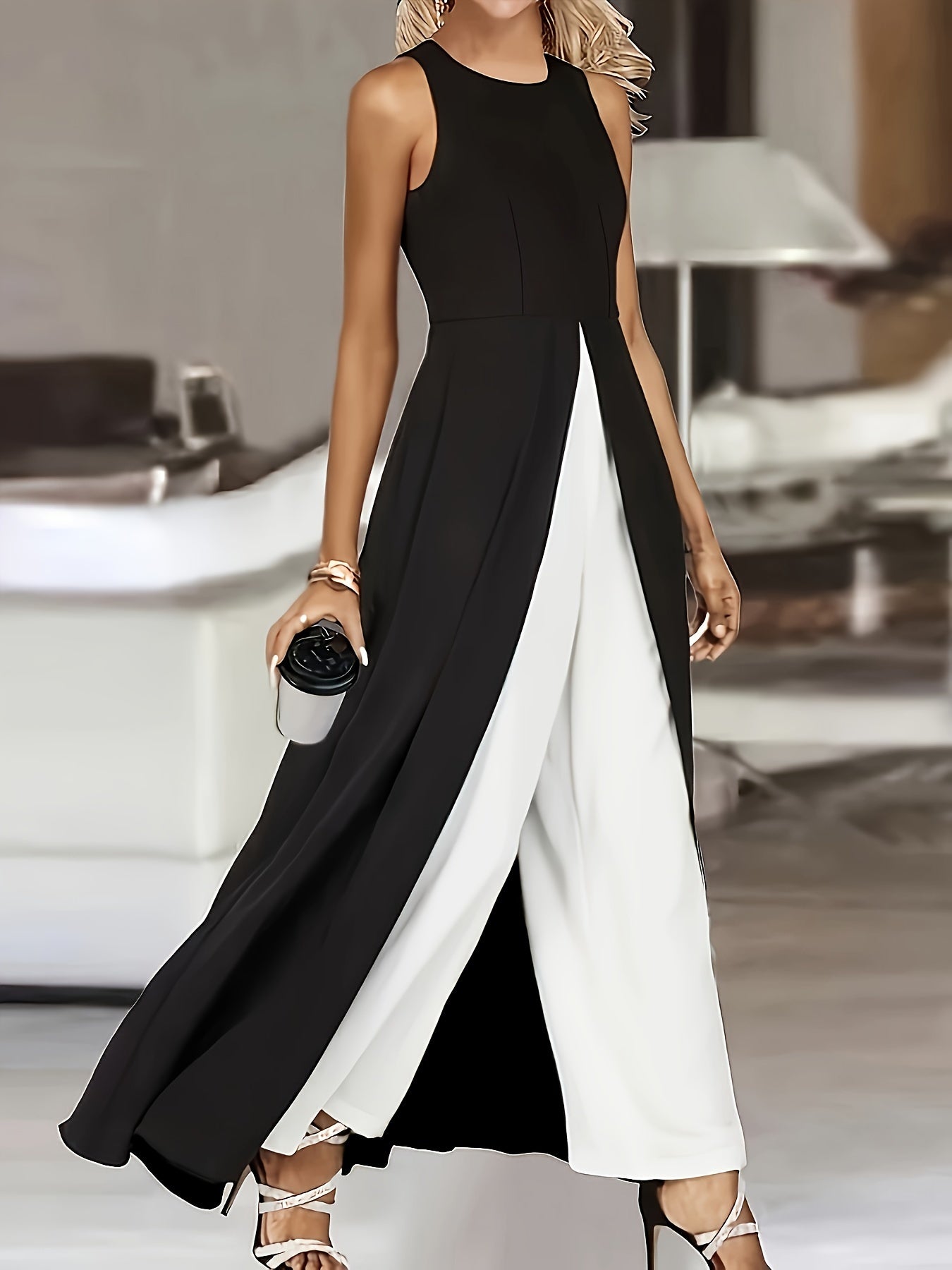 Jumpsuit élégant sans manches avec jambes larges pour le printemps et l'été