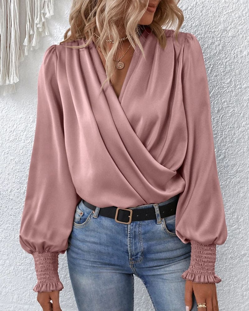 Blouse élégante à manches longues enroulée
