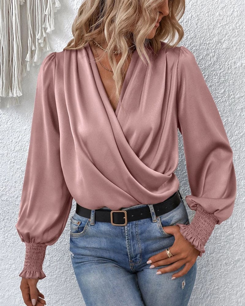 Blouse élégante à manches longues enroulée