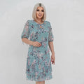 Évelie | Robe à motif floral délicat et manches 3/4