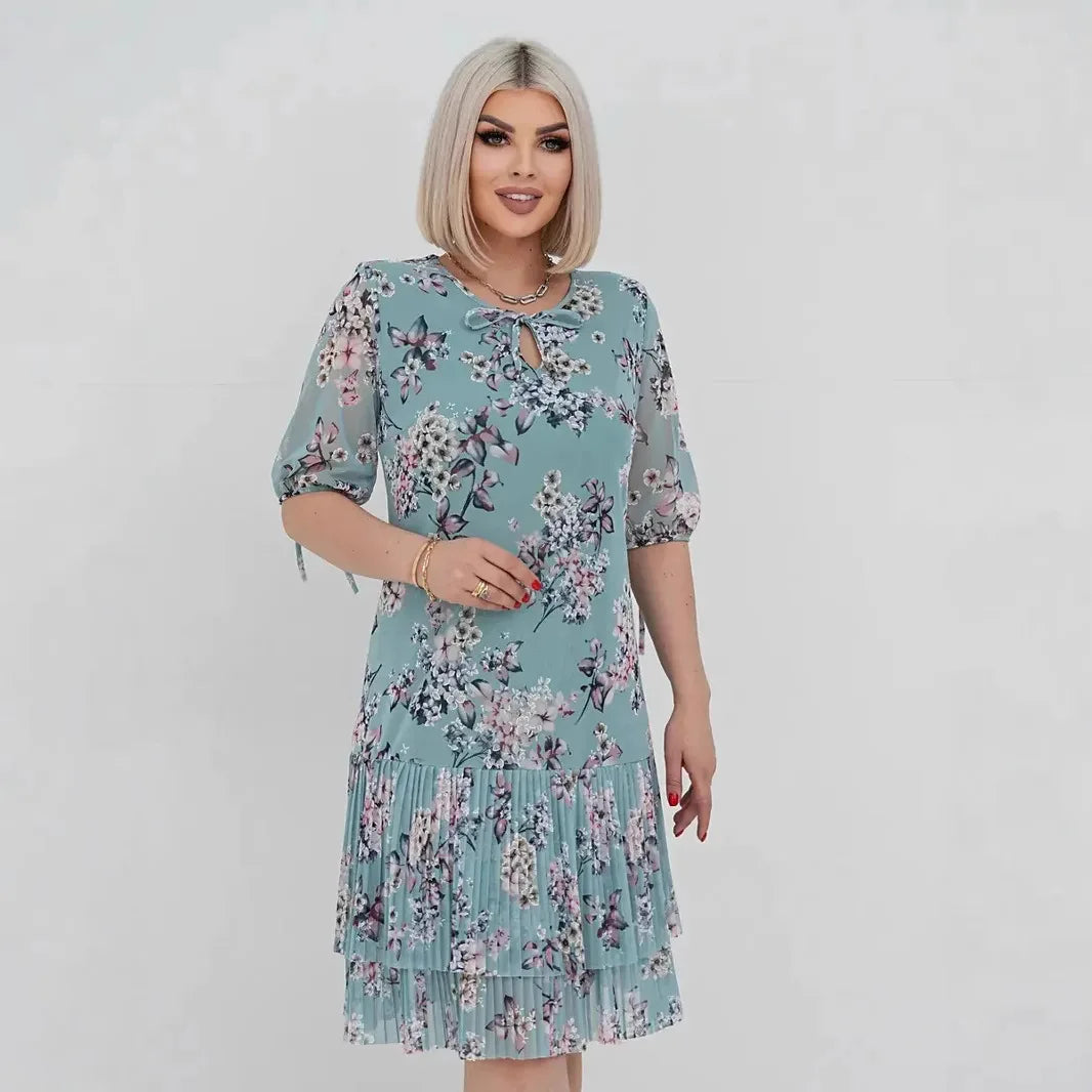 Évelie | Robe à motif floral délicat et manches 3/4