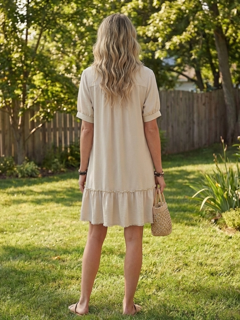 Sabine | Robe à manches courtes avec boutons et ourlet volanté