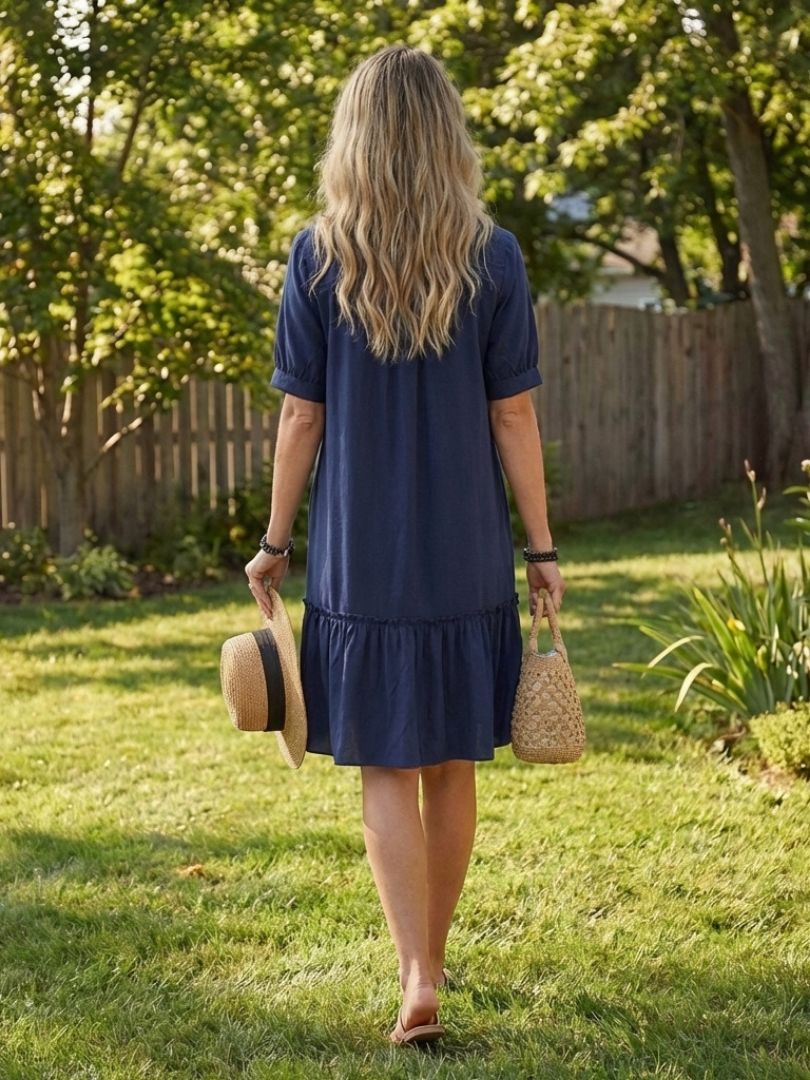Sabine | Robe à manches courtes avec boutons et ourlet volanté