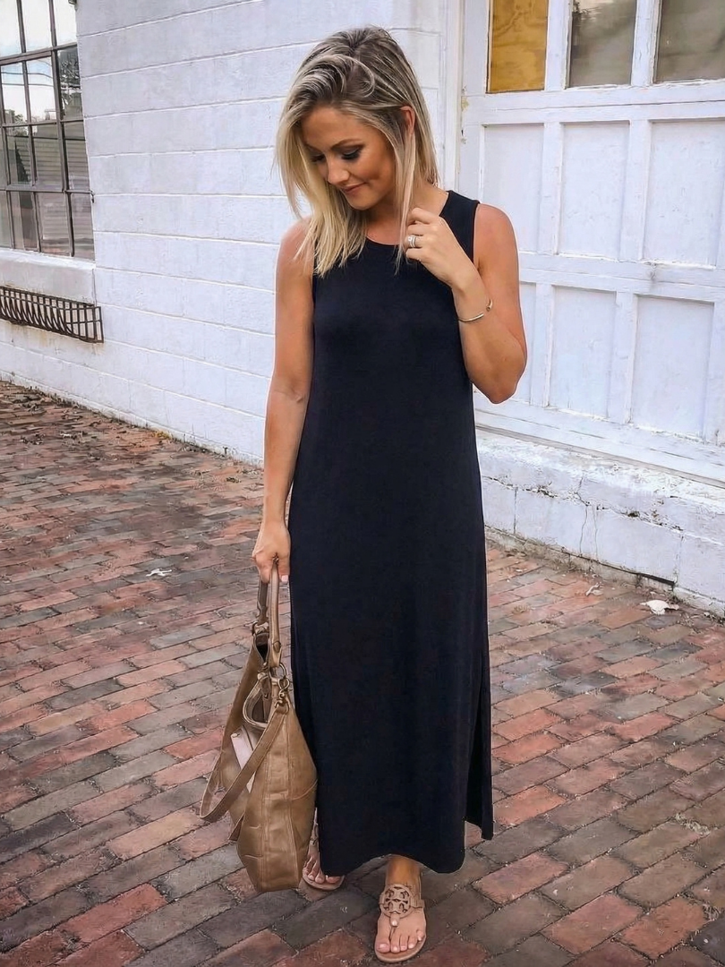 Zorina | Robe midi sans manches avec poches et fente latérale