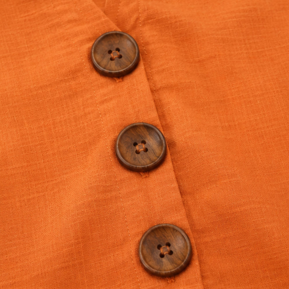 Laurelle – Blouse à manches volantées et décolleté en V avec boutons