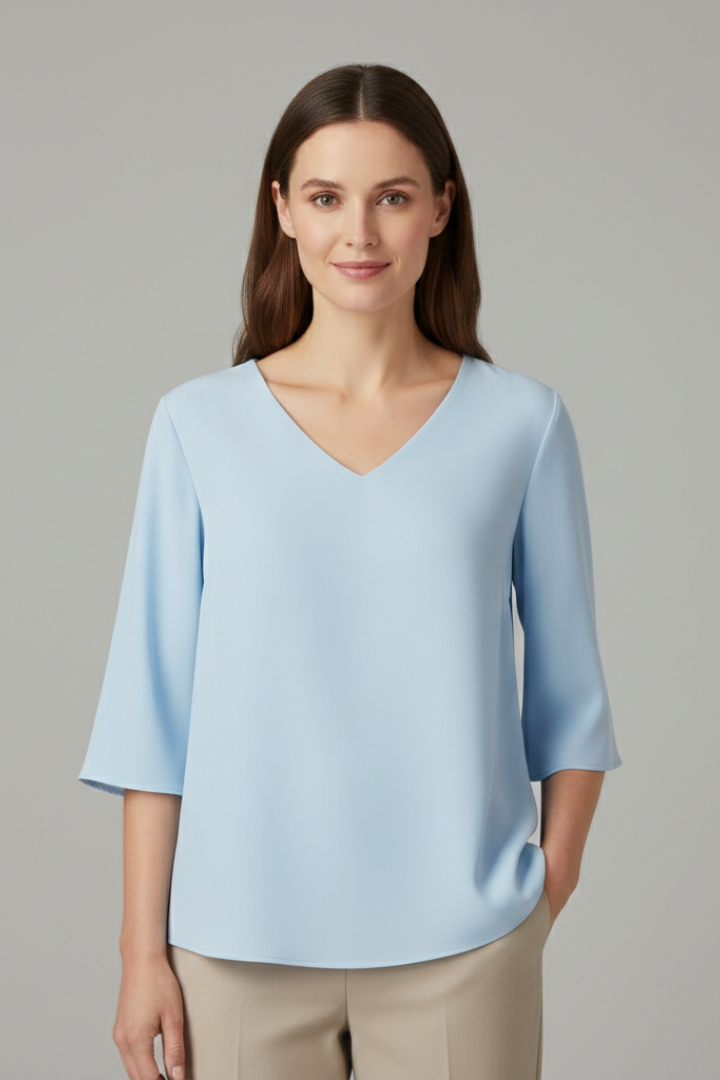 Blouse pour femmes avec décolleté en V et manches trois-quarts