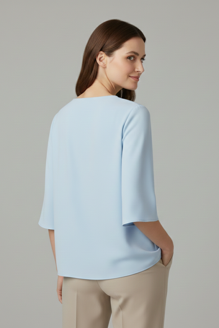 Blouse pour femmes avec décolleté en V et manches trois-quarts