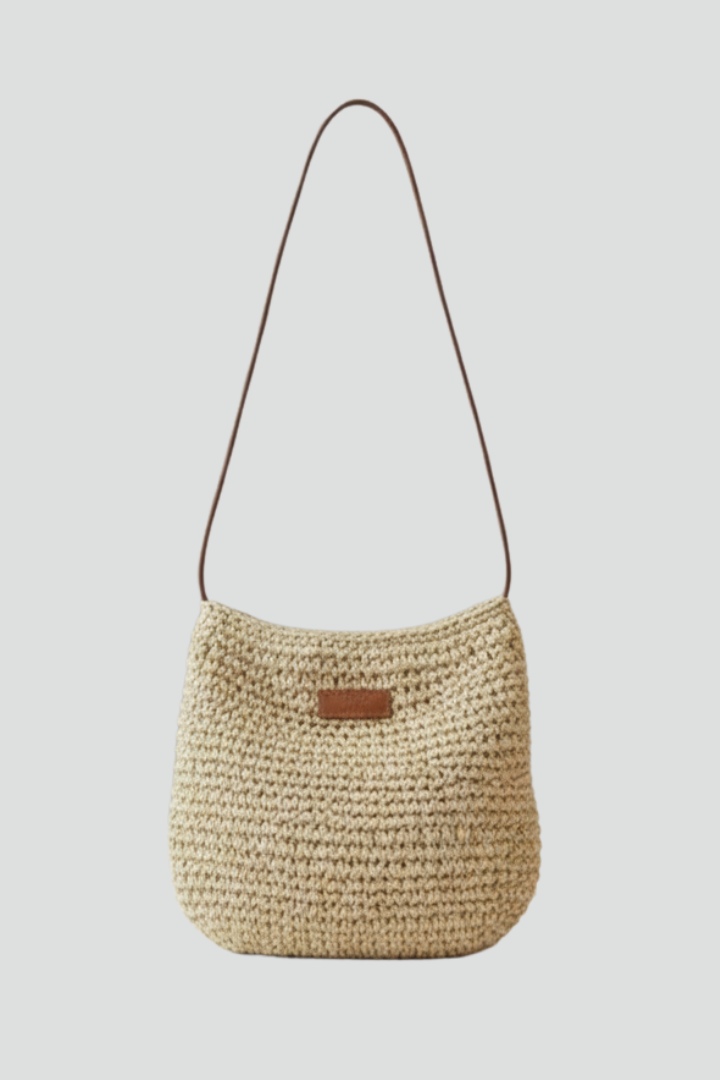 Sac à bandoulière pour femmes avec surface tissée et longue sangle