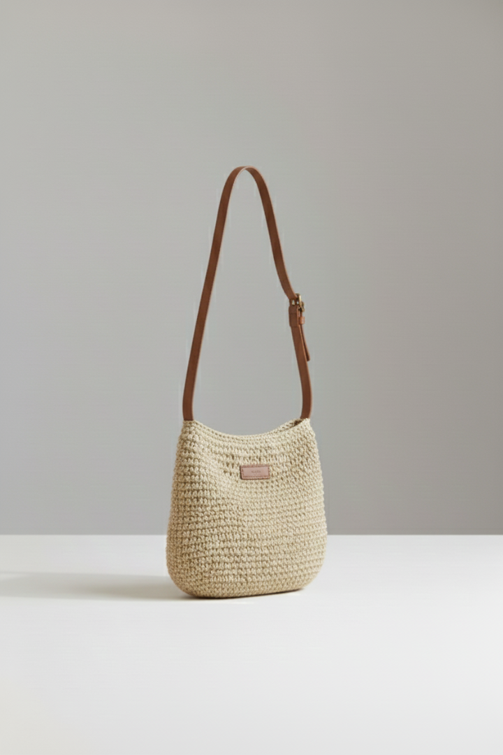 Sac à bandoulière pour femmes avec surface tissée et longue sangle