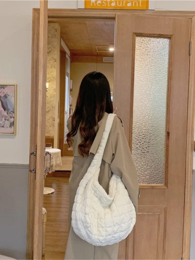 Sac à bandoulière en duvet – Le compagnon de voyage parfait !