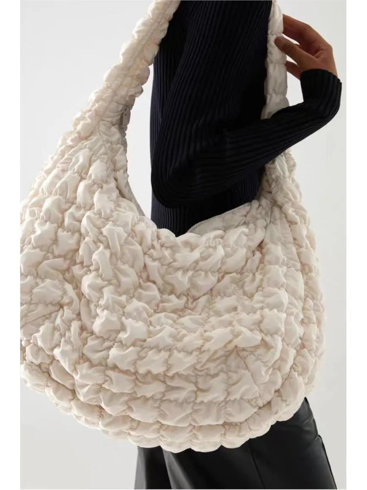 Sac à bandoulière en duvet – Le compagnon de voyage parfait !