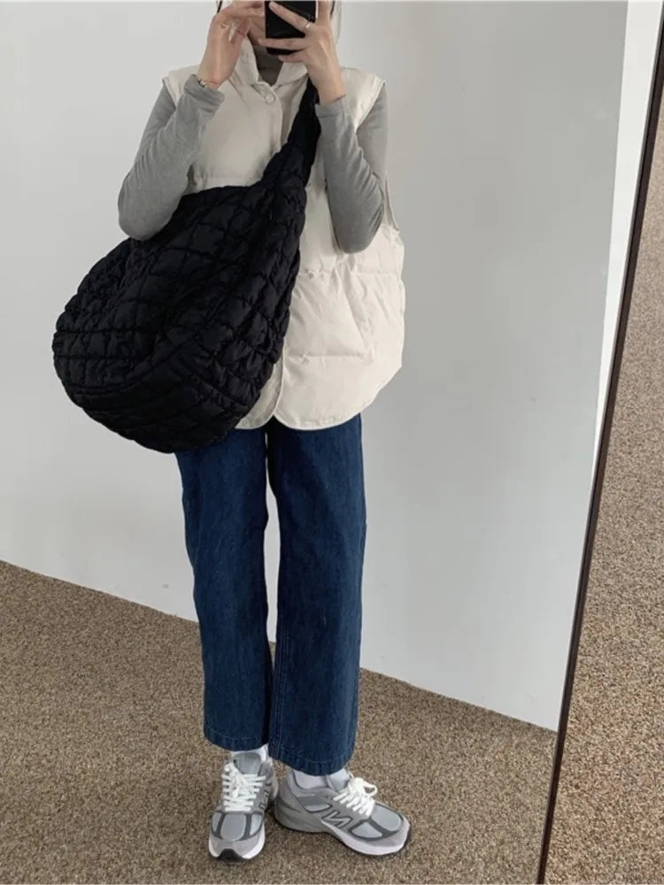 Sac à bandoulière en duvet – Le compagnon de voyage parfait !