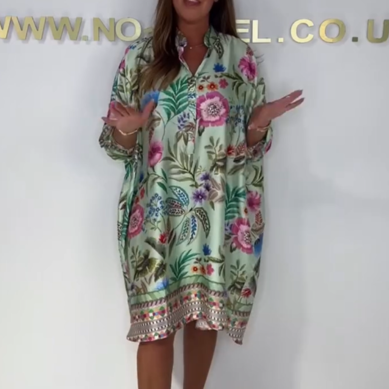 Debie | Robe à fleurs confortable avec décolleté en V et boutonnière devant